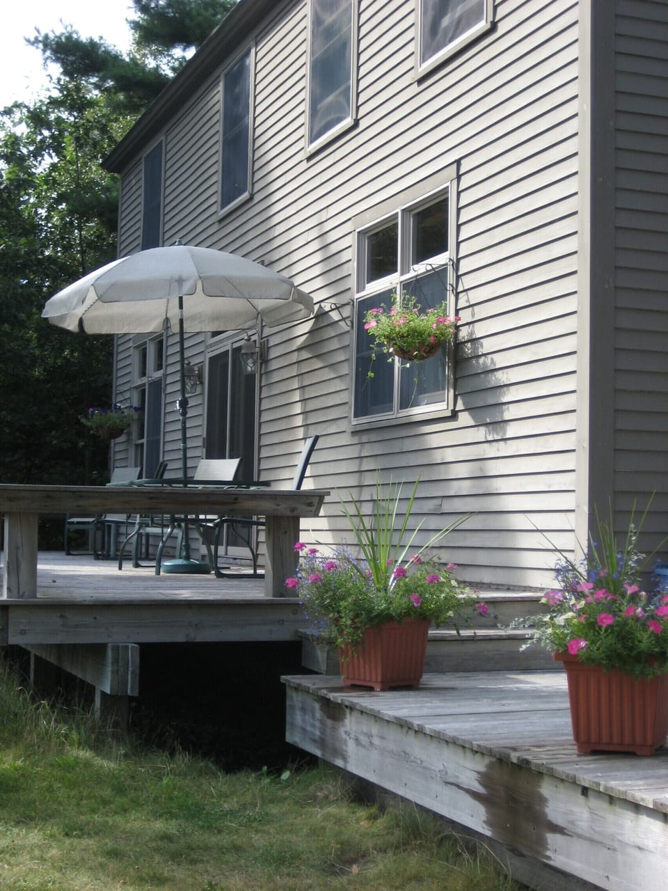 Backyard Patio with lawn chairs and table
