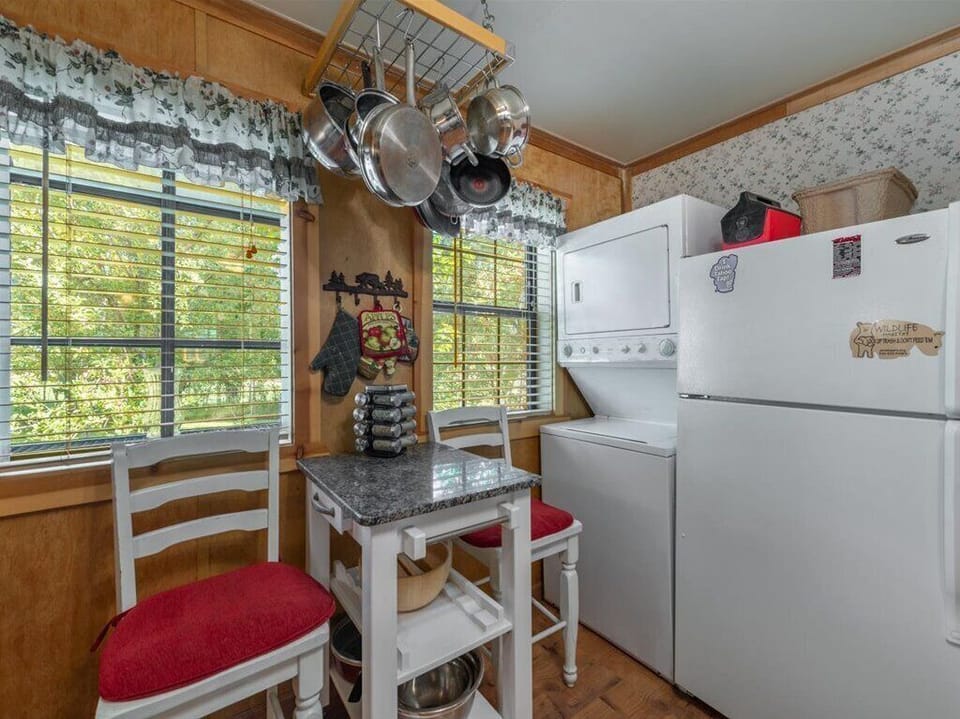 Note the hanging stainless-steel pots and pans for preparing your feast