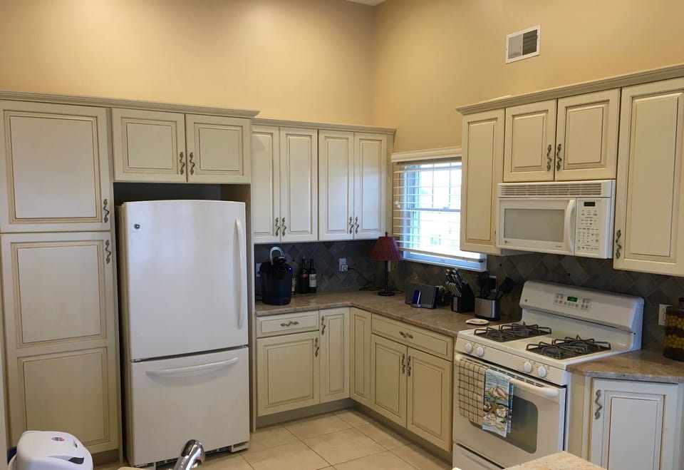 Fully equipped granite kitchen with lots of storage, dishwasher and disposal.