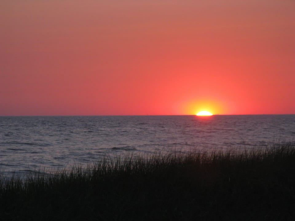 Sun setting over nearby Philbin Beach (Aquinnah residents/renters only)