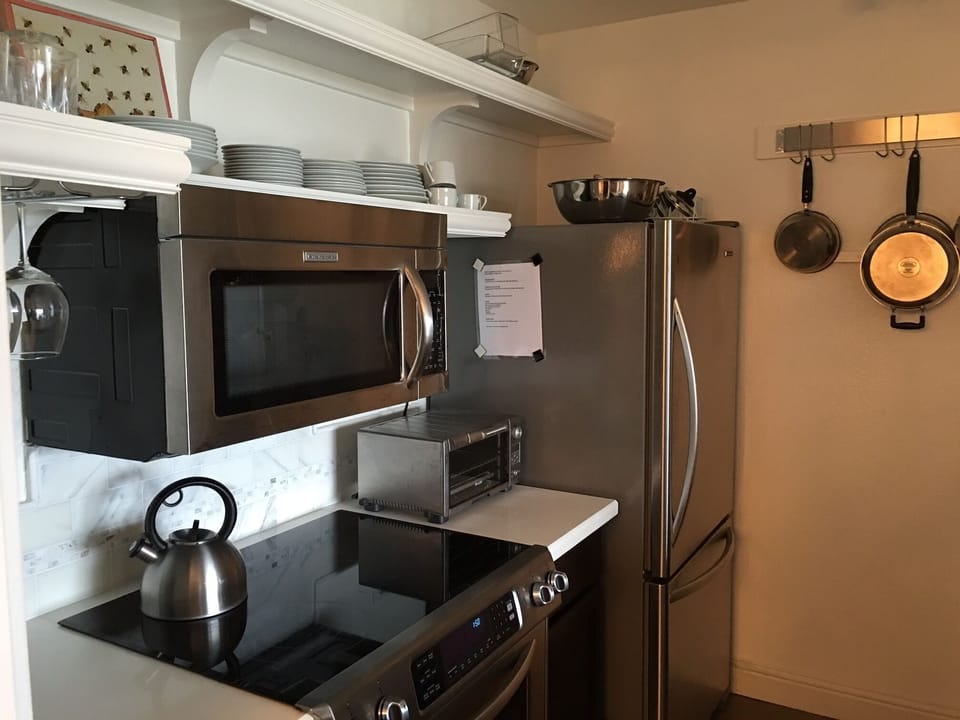 Kitchen has view to Bay