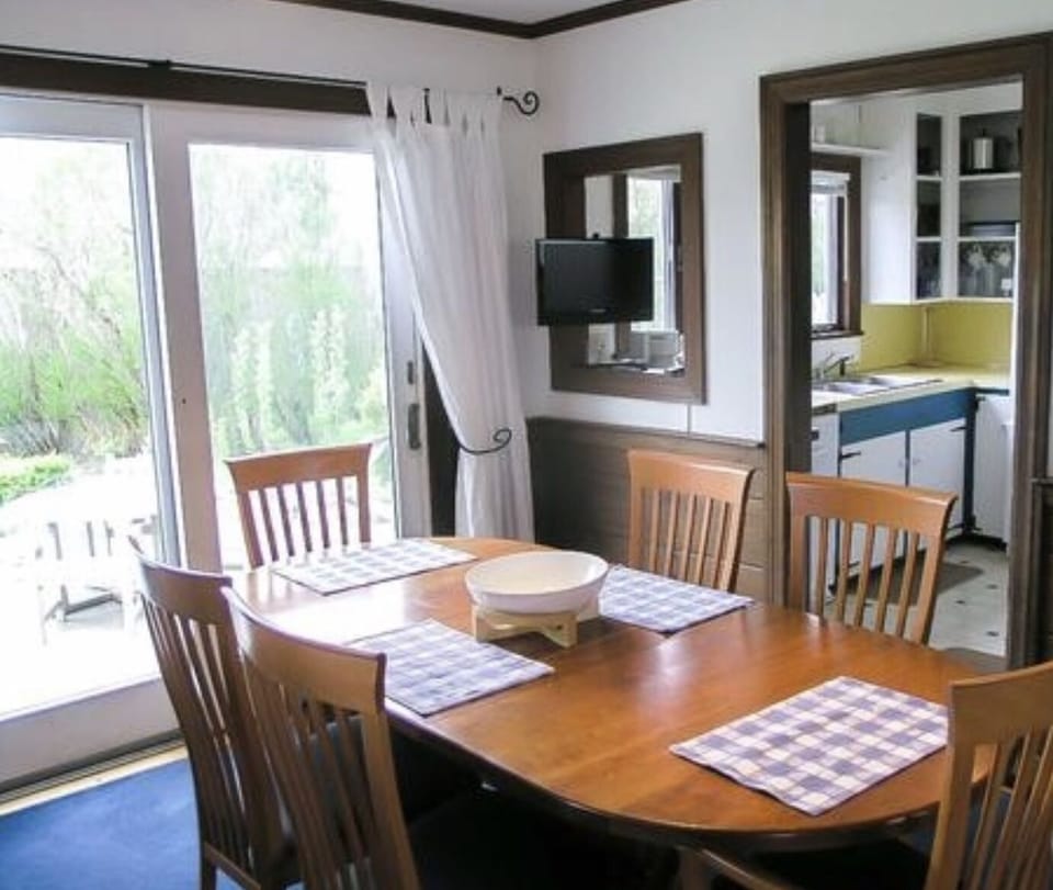 DINING AREA.  WITH LEAF SEATS 8