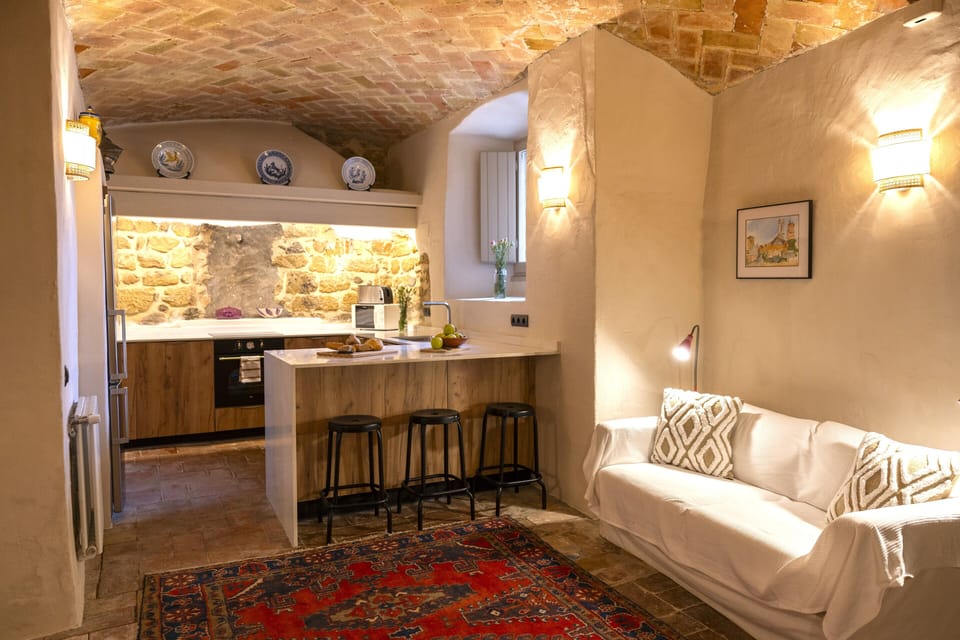 Kitchen with counter and sofa