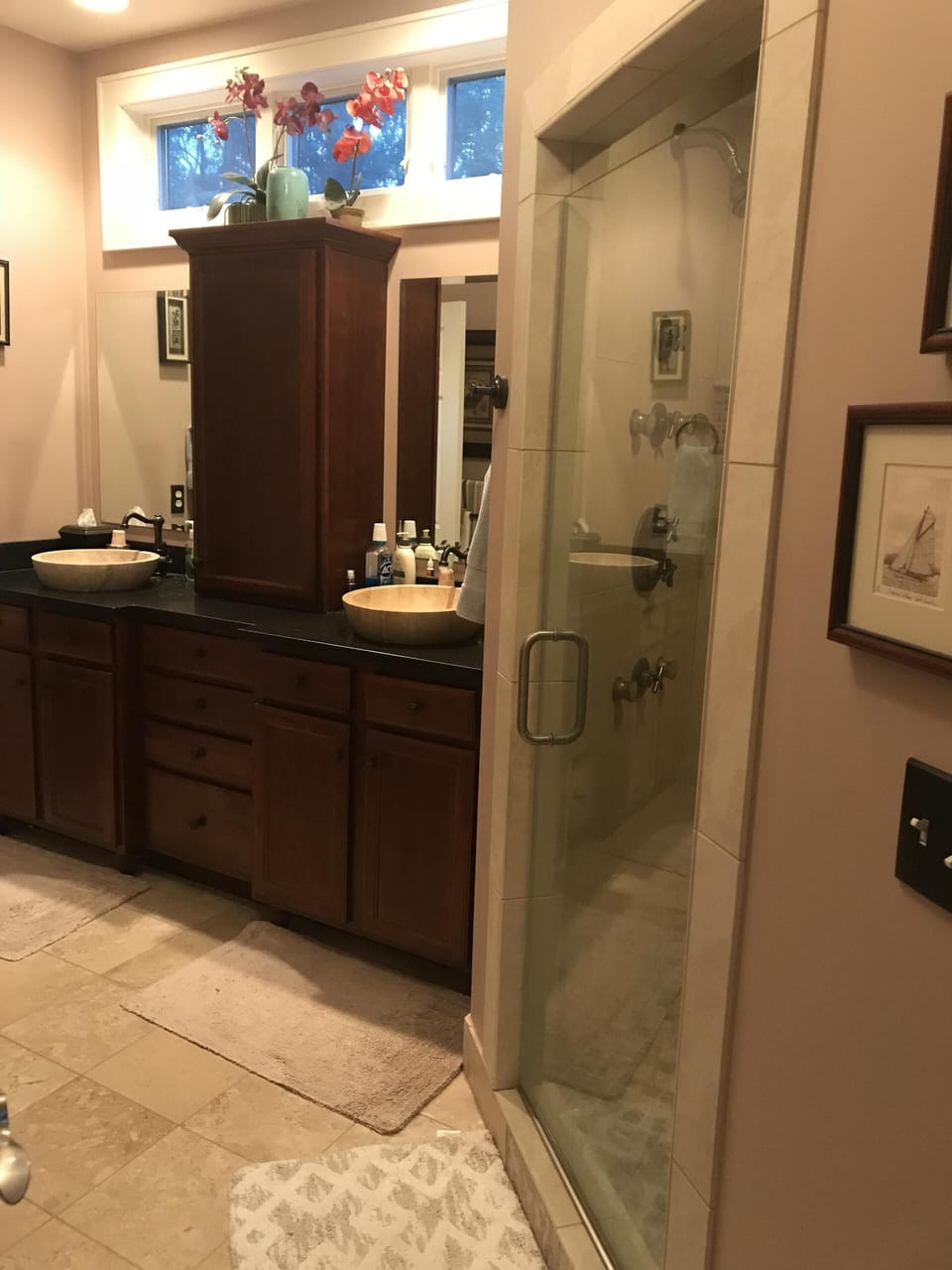 Master bath w/corner seat w/ hand shower plus  4 body spray, heated towel rack.