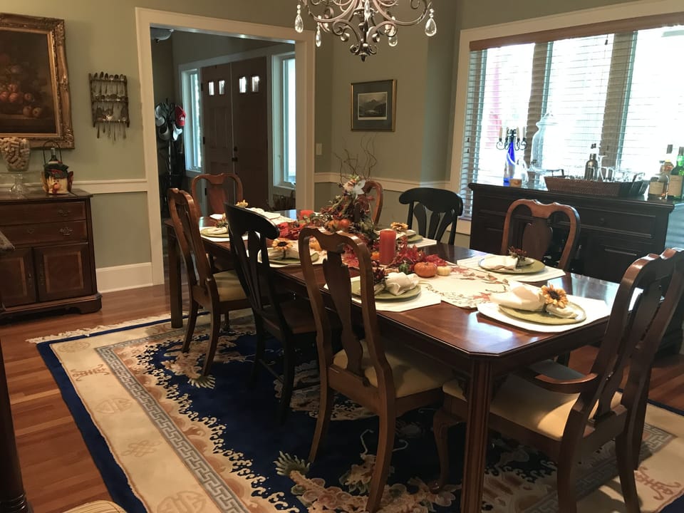 Formal Diningroom with buffet and 2 side servers