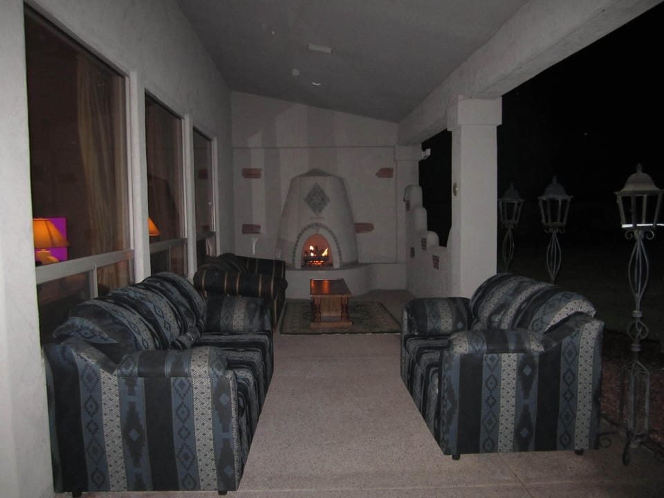 Patio with a Gas fireplace, nice and warm to sit by on chilly winter nights!