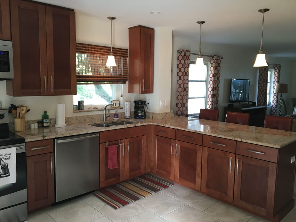 Kitchen with granite and stainless steel appliances