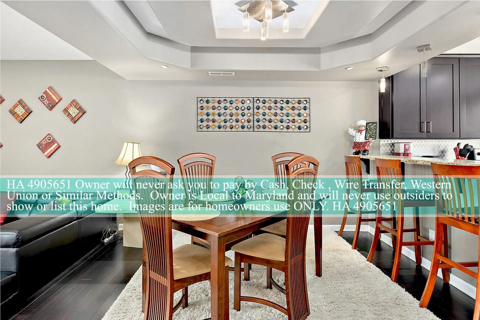 Dinning area with breath taking tray ceiling.  Also Bose Sound system.