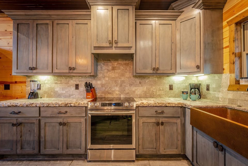 The fully stocked kitchen with gas range is perfect for cooking group meals.