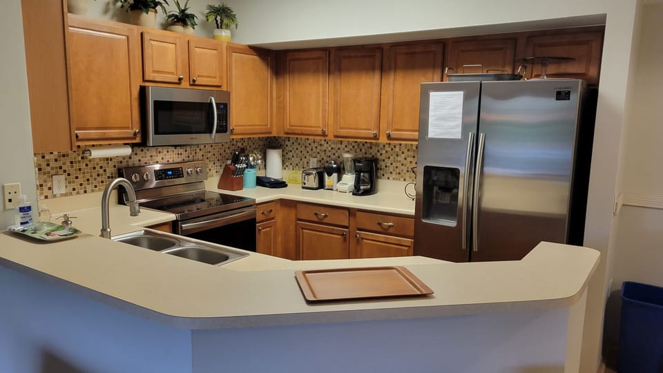 Fully equipped kitchen with stainless steel appliances