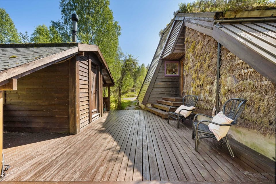 Toilet house with shower.