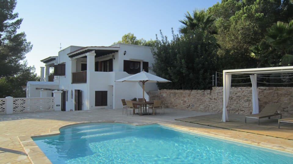 Pool and house