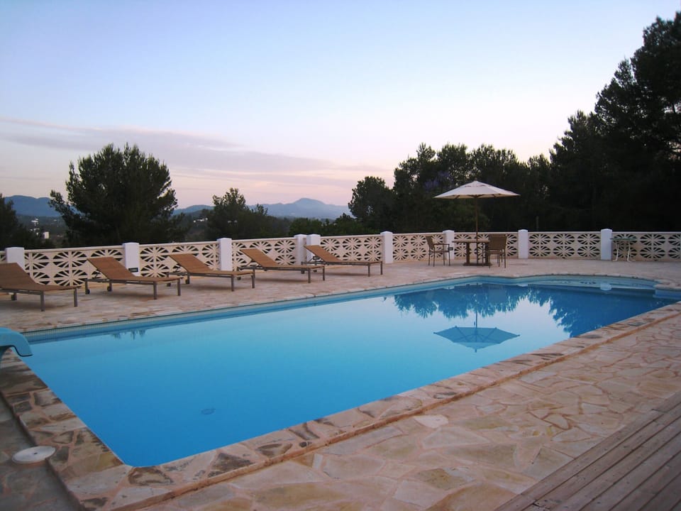 Superb 12 m x 5 m pool at dusk