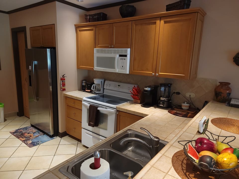 Kitchen area, not pictured are the washer and dryer, also in the room on left.
