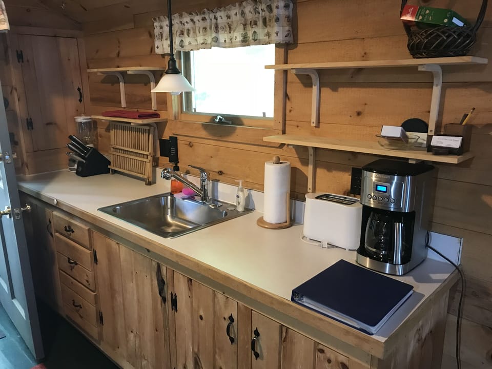 opposite side of kitchen with toaster and coffee maker.  