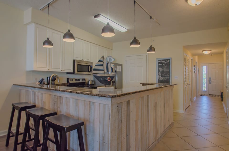 Newly Remolded Kitchen lighting and bar