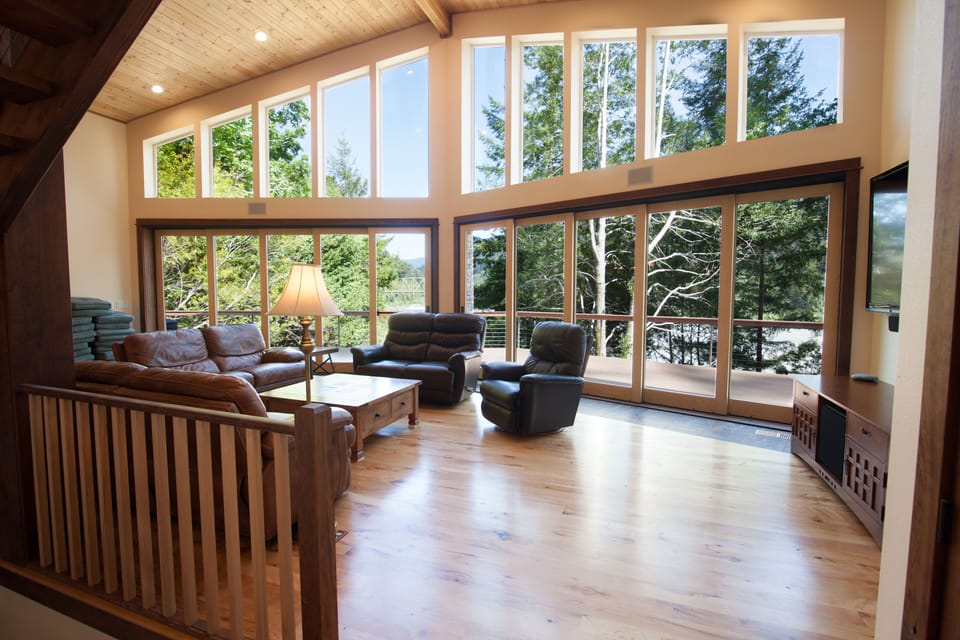 Beautiful open living room emphasizes the view and lets in natural light.