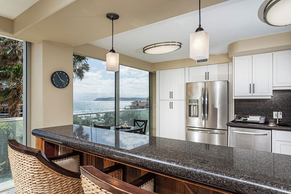 Enjoy a snack at the bar or at the kitchenette table.
