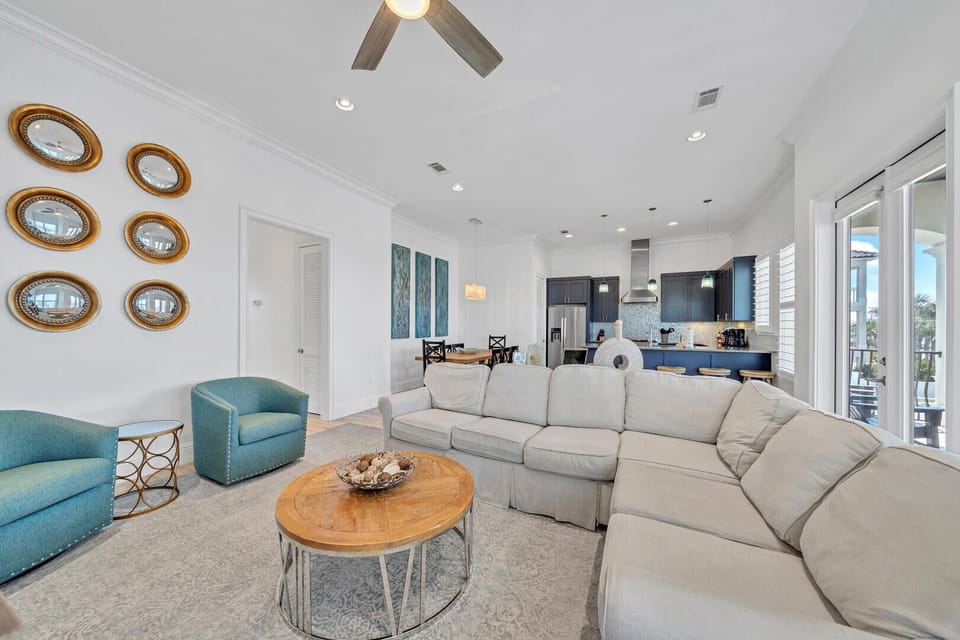 The open-plan kitchen-living-dining spaces provide a great place for gathering!