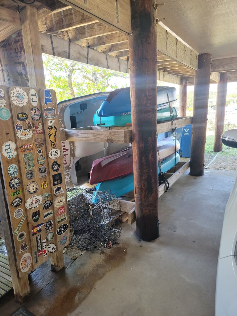 Private outdoor shower (hot/cold water) and kayak/paddleboat rack. 