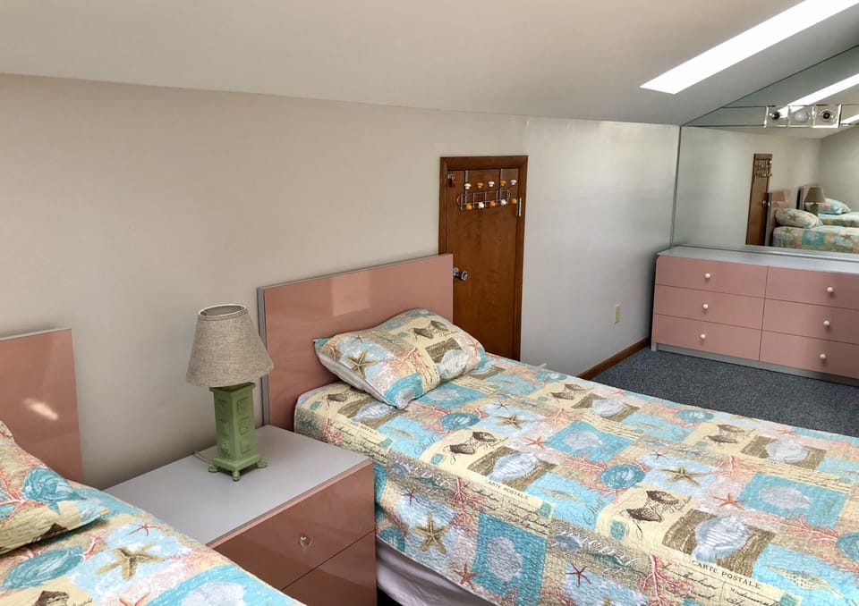 Alternate view of 3rd floor bedroom with two twins. 