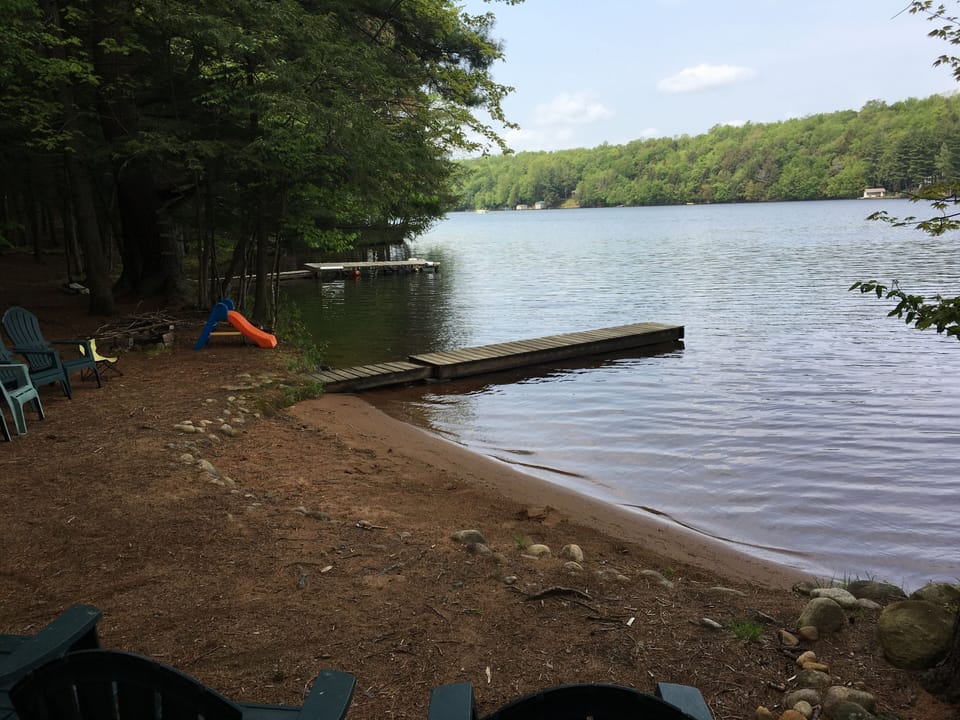 Beach for swimming and sand castles. Two docks for wading and boat parking.