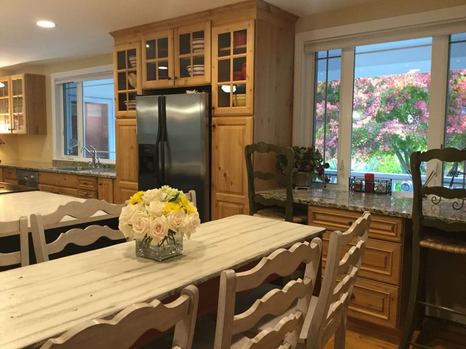 Gourmet kitchen with views of the front garden.