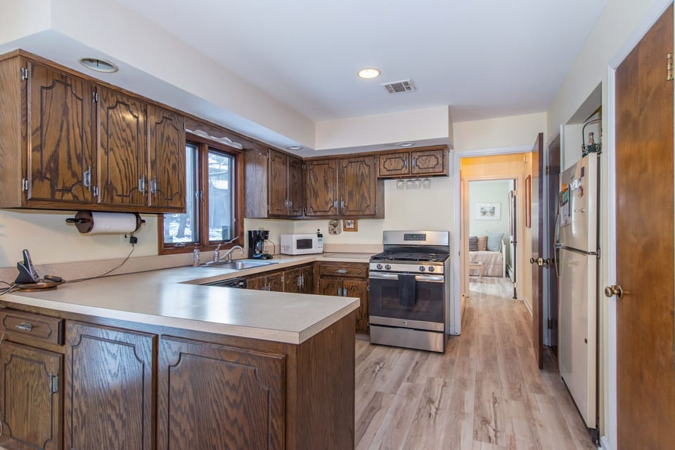 Kitchen area, new stove 2020.  New floors 2021.