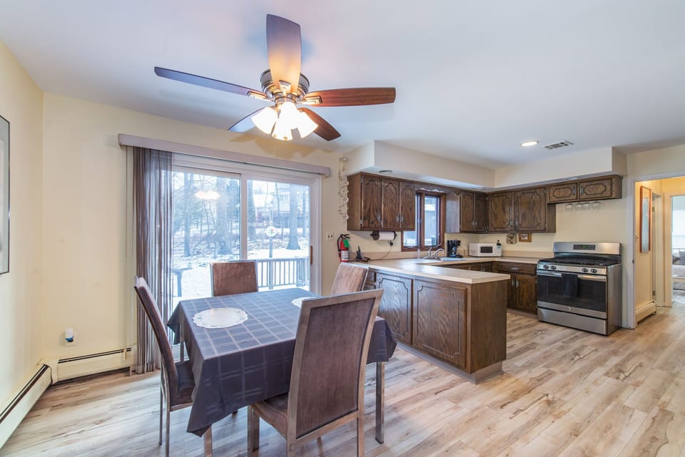 Kitchen, Dinette area opens to deck & backyard.  Kitchen table seats 4.