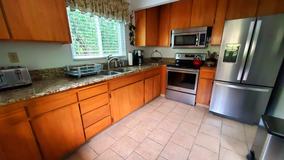 A view of the kitchen, facing the amenities.
