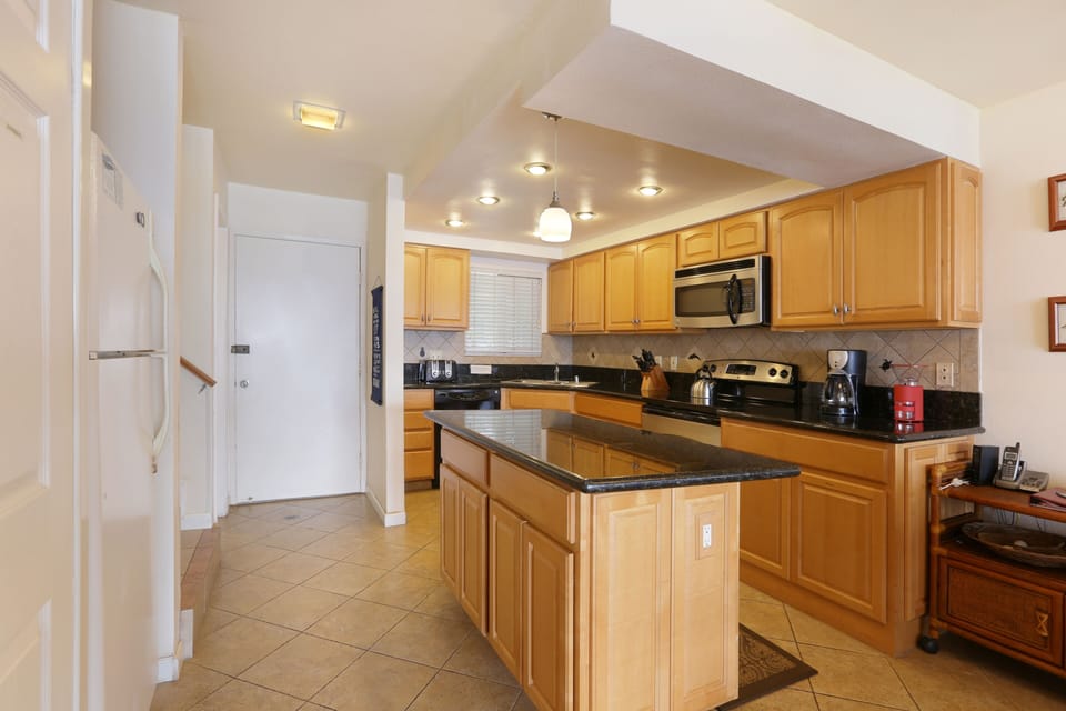 But you can definitely cook in this modern kitchen with lots of counter space.