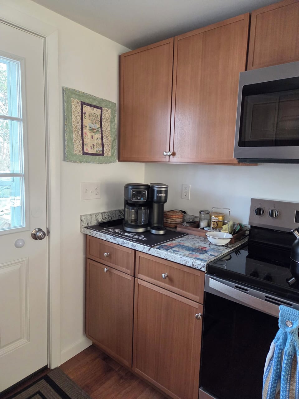 Coffee nook and new microwave and electric range.