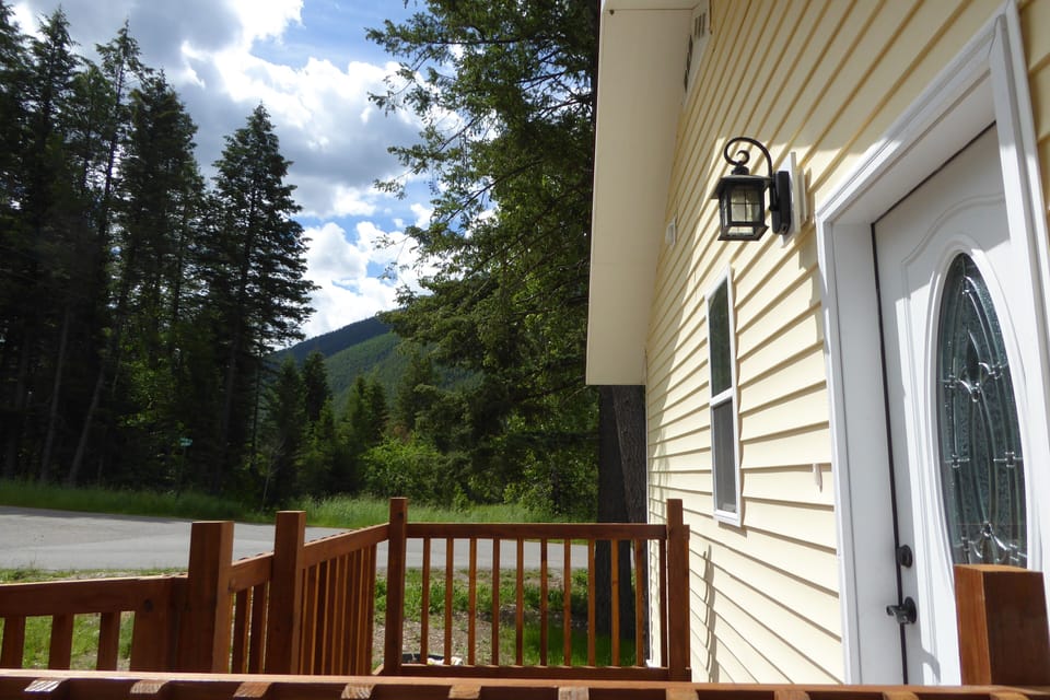 your front door; Flathead River path across road; Columbia Mountain