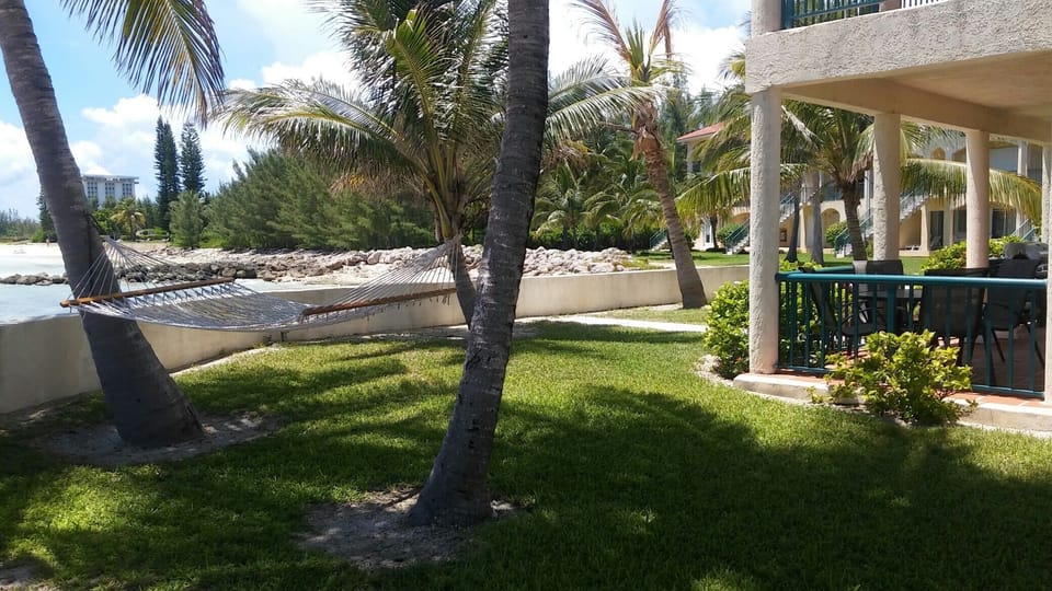 Relax on your own patio overlooking the ocean.
