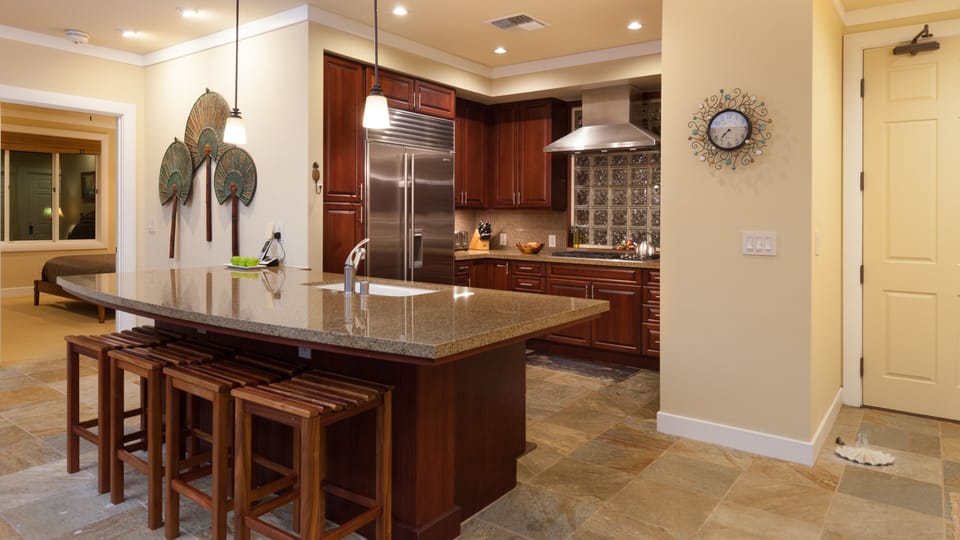 High end gourmet kitchen equipped with spices and oils