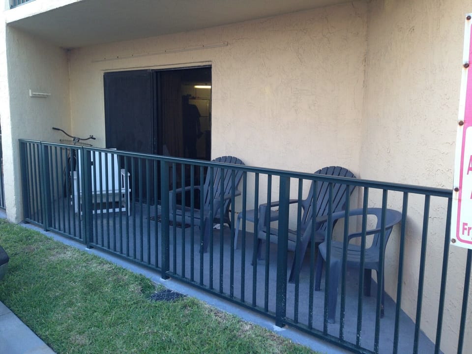 New balcony railing added in 2016.  Great for storing beach toys.