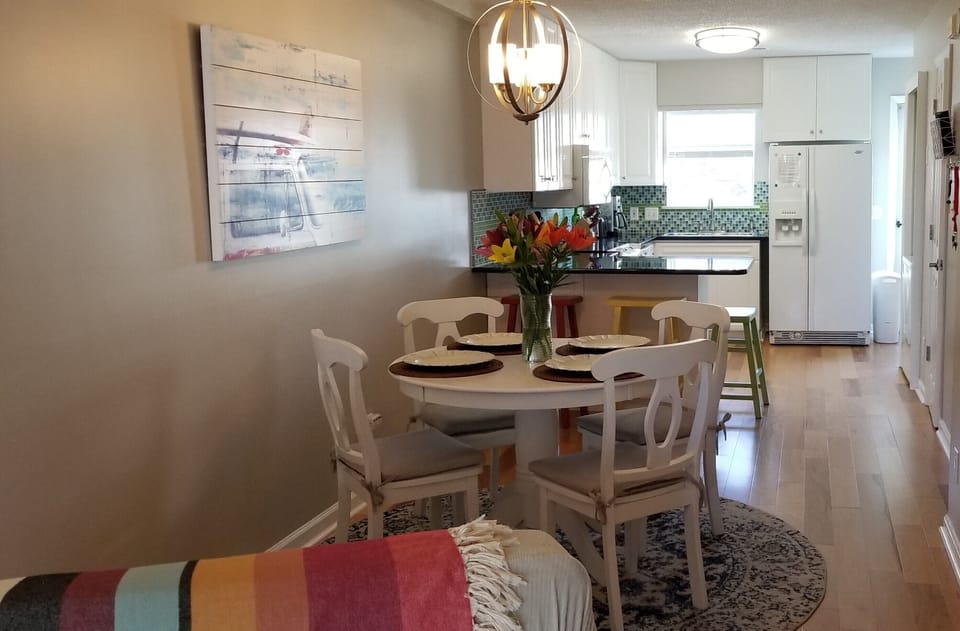 Dining area looking into the updated kitchen