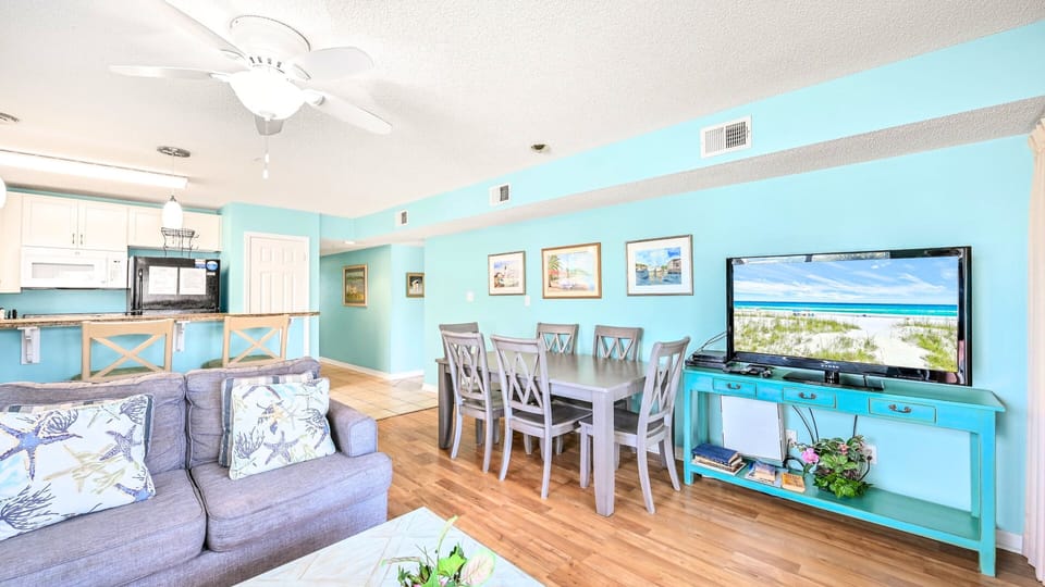 Gather at the table beside a fun aquarium accent.