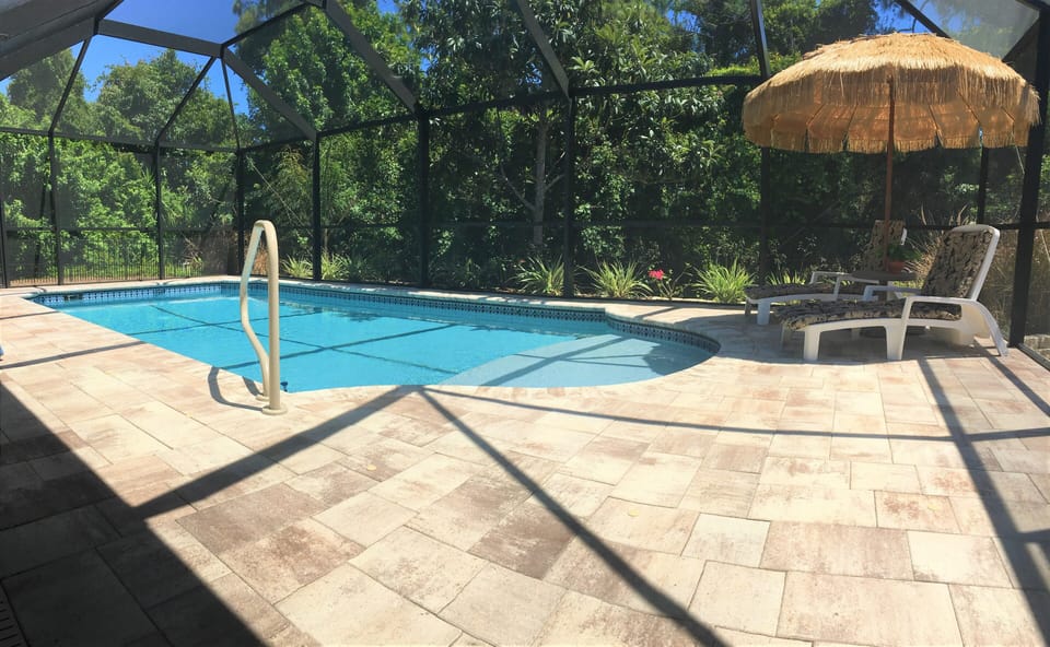 Pool area is private. Pool has built-in sundeck. Yard is completely fenced in. 