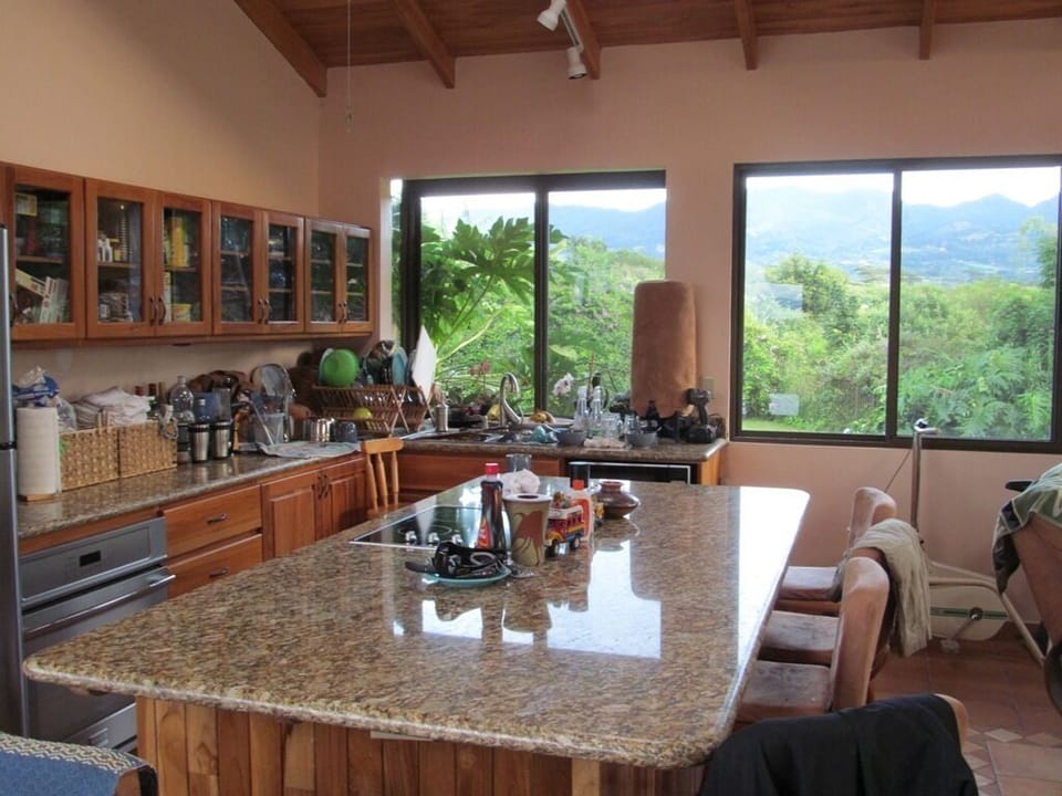 Kitchen cooking island, 7 bar stools, new convection oven to left