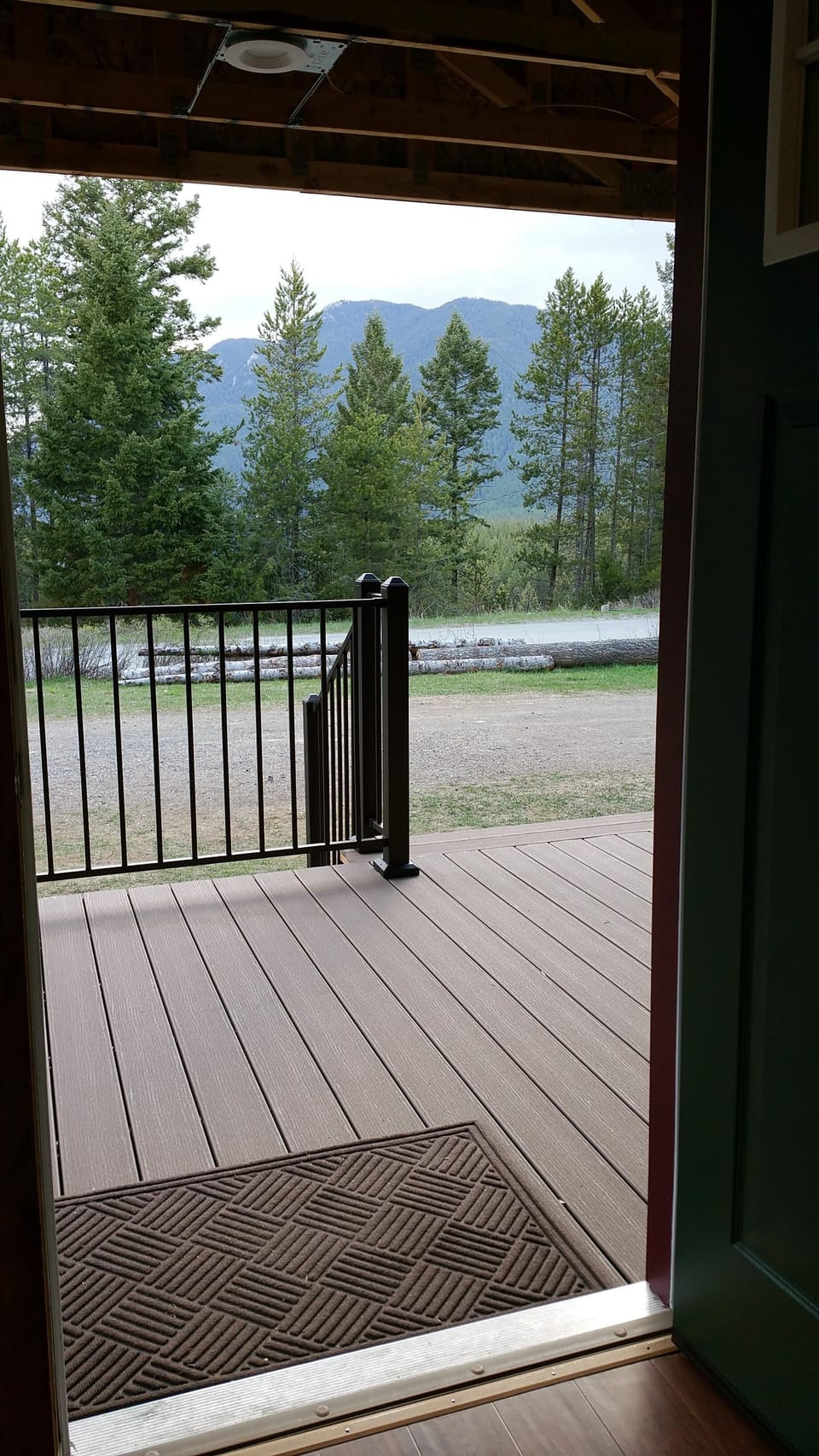 Deck looking to the West and the parking lot. Park in front of your cabin.