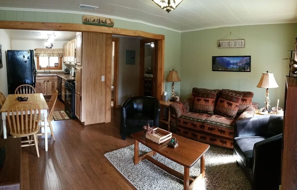 Kitchen, dining area and living room.
