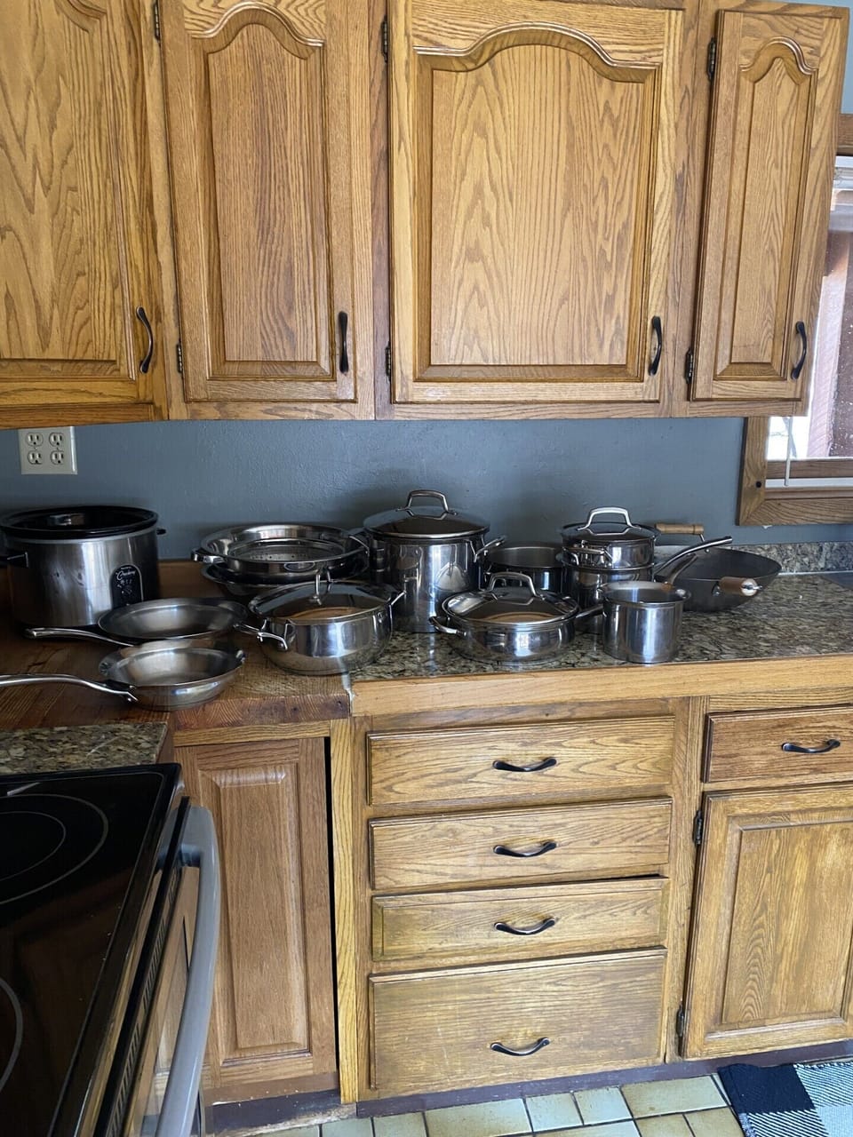 Our 13-piece set of Kirkland "Professional Quality" stainless steel pans
