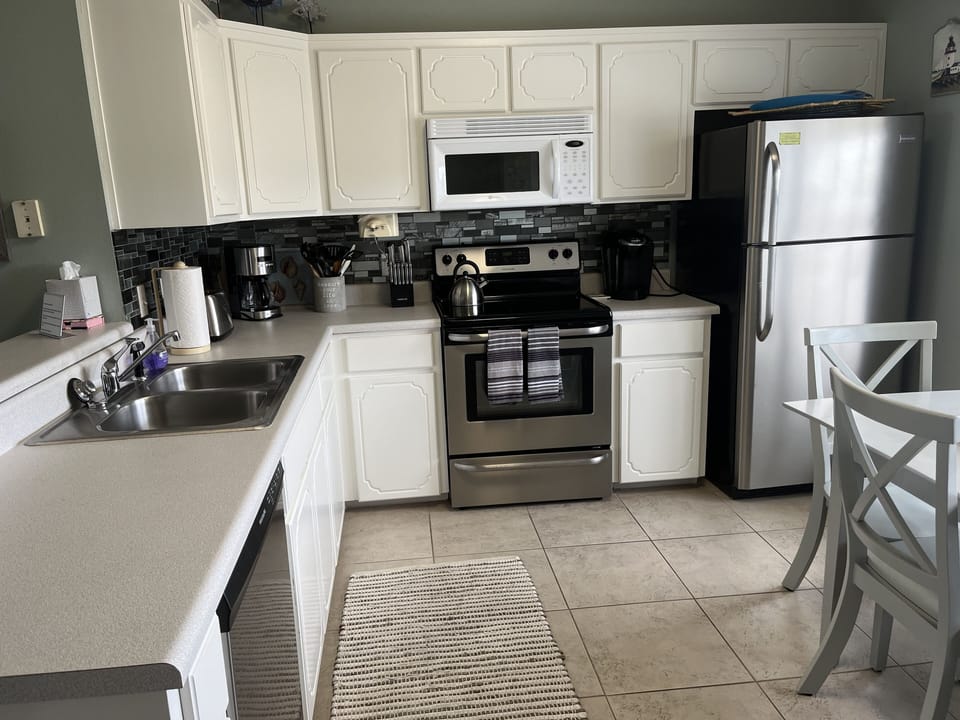 Kitchen fully stocked with all appliances