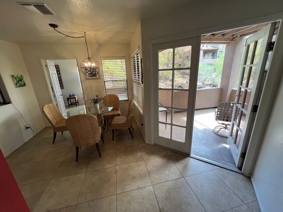 Dining area and access to extra large patio. (larger than most in complex)