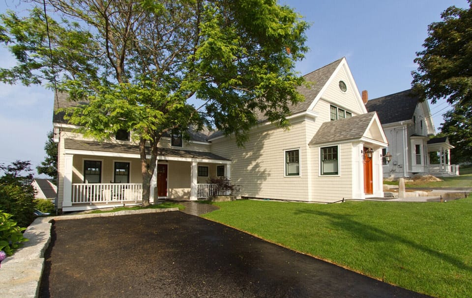 Entrance to home is via covered porch.  Parking for 2 cars.