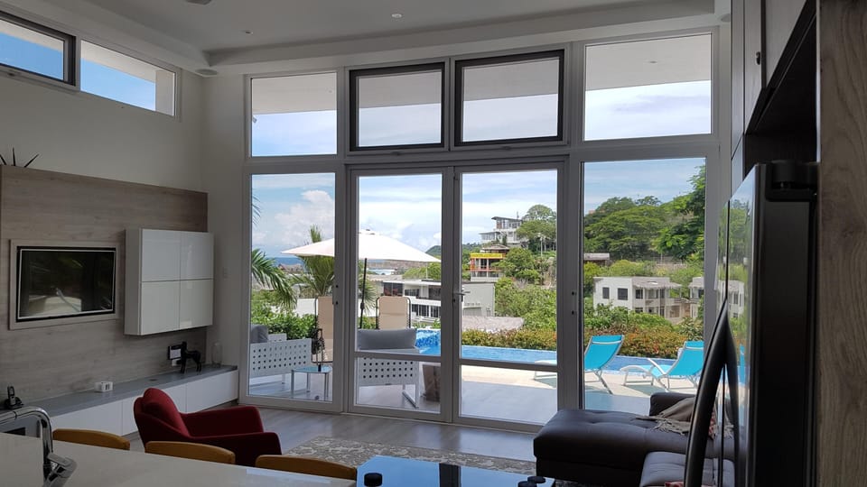 Living room with view outside to terrace
