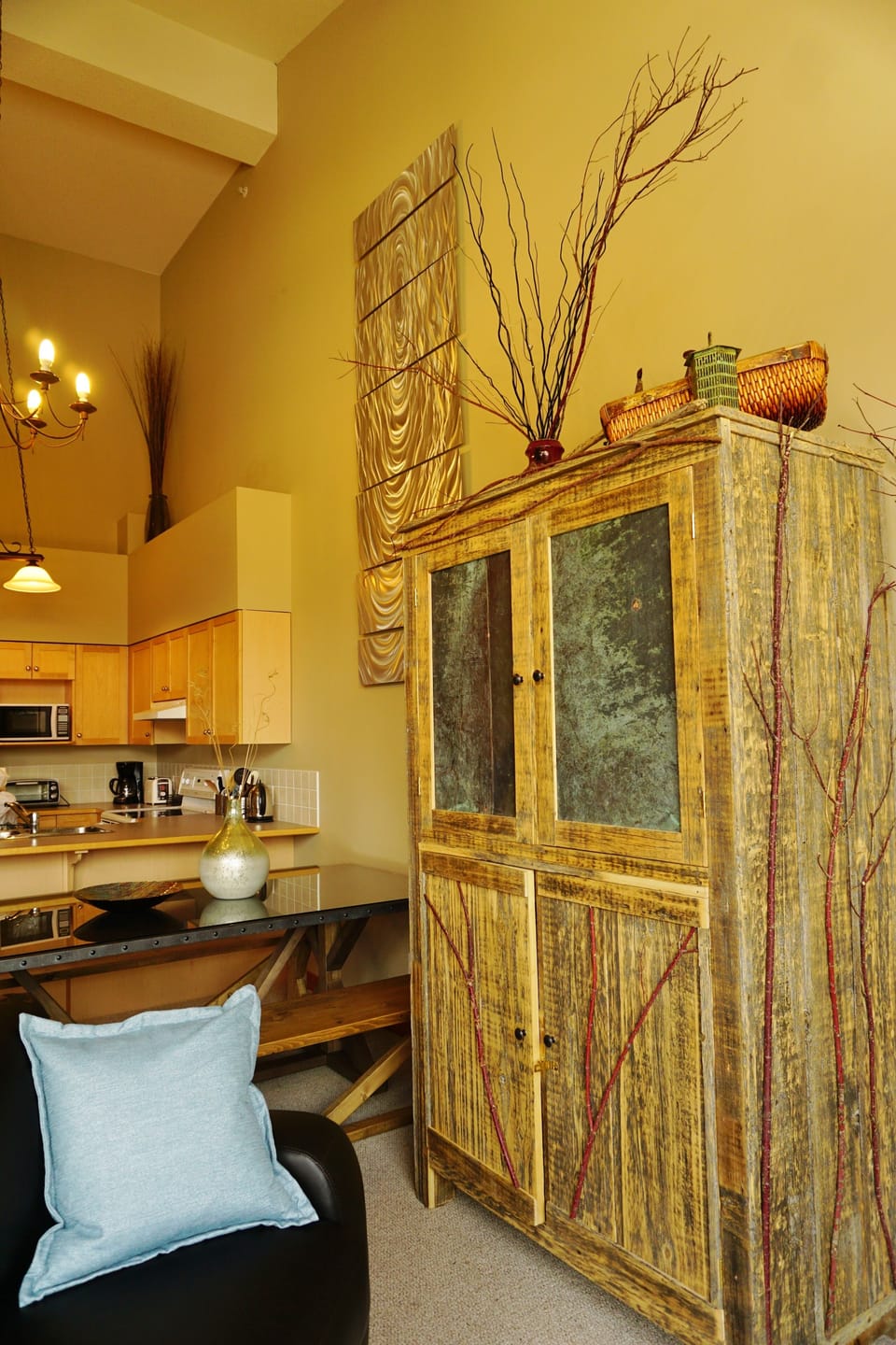 Open kitchen with dishwasher leads into dining/living areas