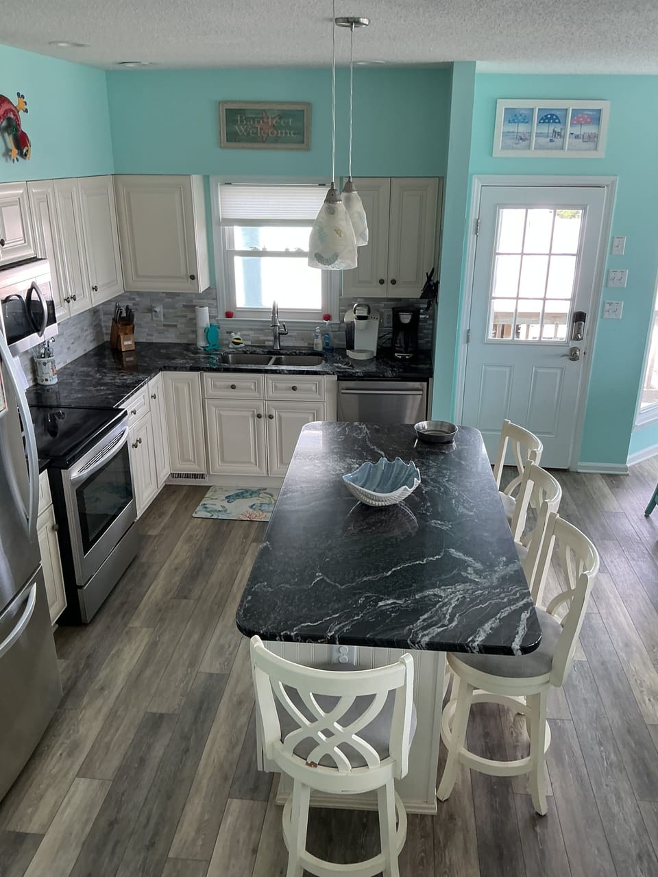 View of the kitchen from the staircase.