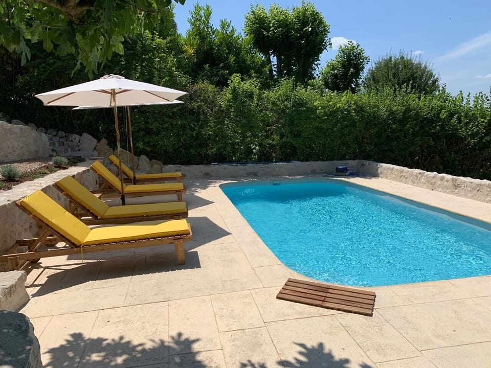 heated salt water pool , sun terrace with view over the Loire River